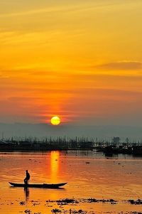 Scenic view of sea at sunset