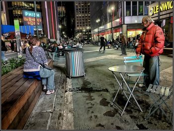 People sitting at town square