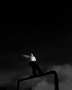 Low angle view of man against sky