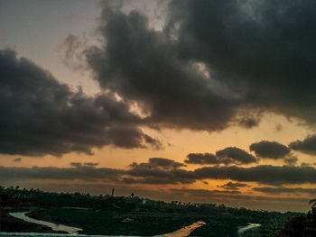 Scenic view of dramatic sky during sunset