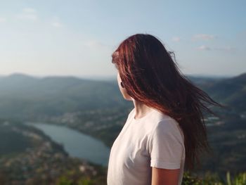 Young woman looking at mountains