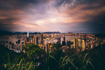 High angle view of buildings against sky during sunset