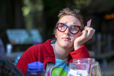 Close-up of young woman with eyeglasses