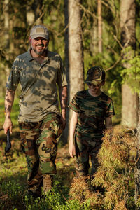 Army soldiers standing in forest