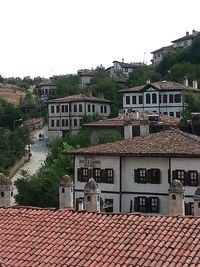 Residential district against clear sky