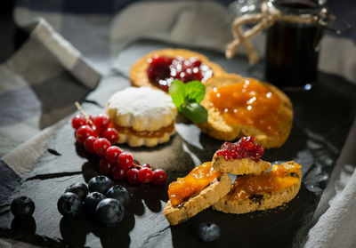 Close-up of dessert in plate on slate