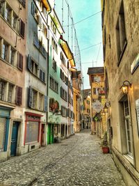 Narrow alley with buildings in background