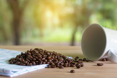 Close-up of coffee beans on table