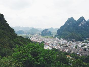 Cityscape with mountains in background