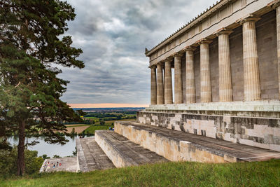 View of old ruin building against cloudy sky