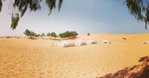 Scenic view of desert against clear sky