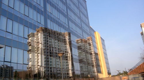 Low angle view of skyscrapers in city