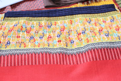 High angle view of multi colored shawl at market stall