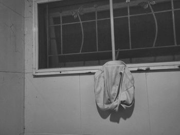 Low angle view of clothes hanging on wall