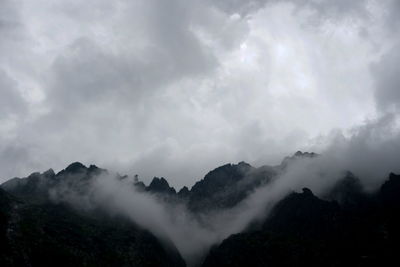 Low angle view of mountains against sky