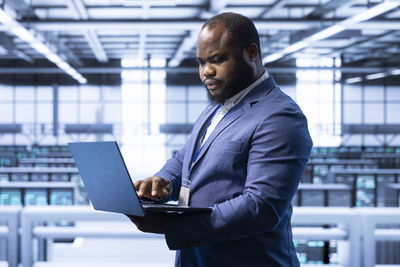 Young man using laptop