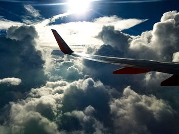 Low angle view of airplane flying in sky