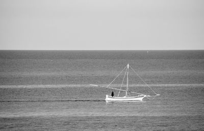 Boat sailing in sea