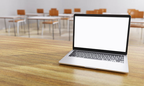 Close-up of laptop on table