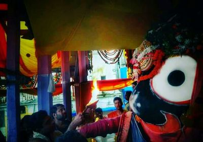 Men hanging in temple