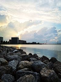 Scenic view of sea against sky at sunset