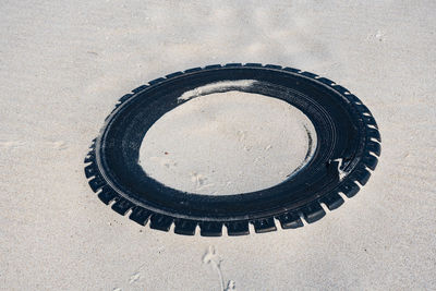 High angle view of tire on sand