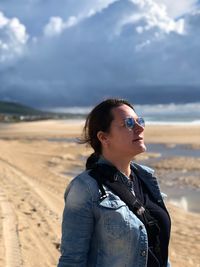 Woman standing at beach