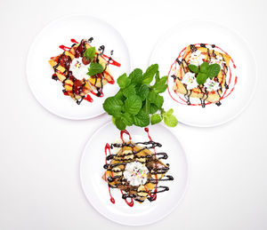 High angle view of vegetables in plate on table