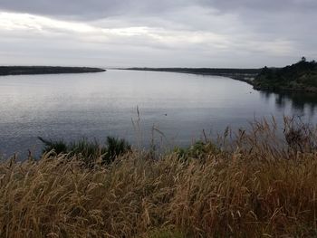 Scenic view of lake against sky