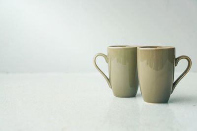 Close-up of coffee cup on table