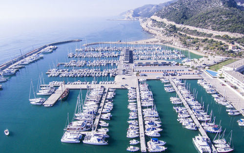 Aerial view of boats moored at harbor