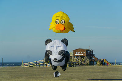 Close-up of toy against sky