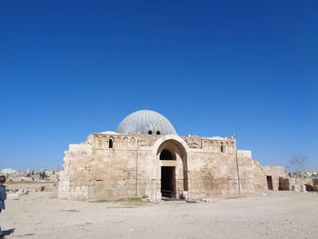 View of historical building against blue sky