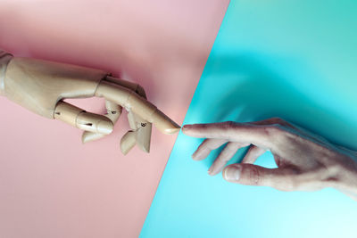 Close-up of woman hand on wall