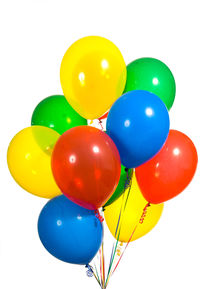 Low angle view of balloons against white background