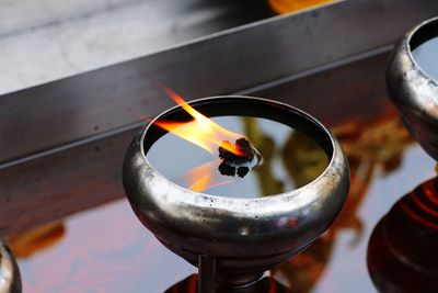 Close-up of illuminated diya