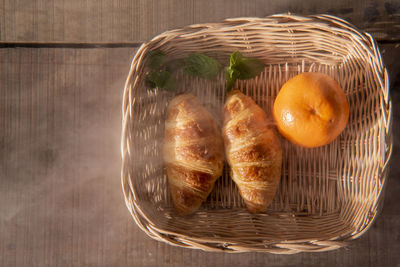 High angle view of food in wicker basket on table