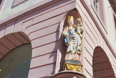 A sculpture on the corner of a medieval building in trier, the oldest city in germany