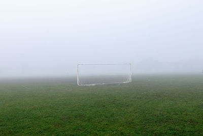 View of soccer field in foggy weather