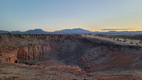 Scenic view of desert against clear sky