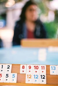 Close-up of woman relaxing on table