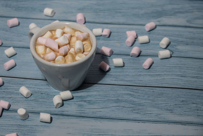 Close-up of pills in bowl on table