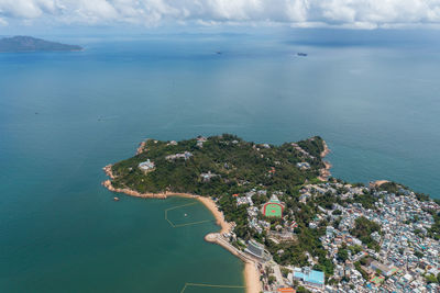 Aerial view of townscape by sea