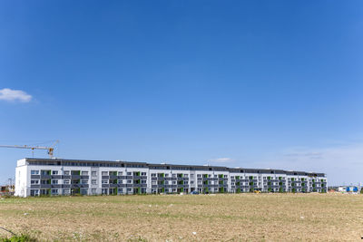 View of building against clear blue sky