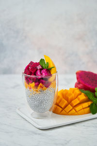 Close-up of ice cream in glass on table