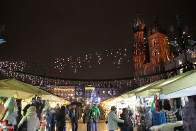 Panoramic view of crowd at night