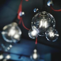 Close-up of illuminated light bulb