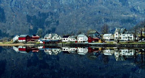 High angle view of houses by lake