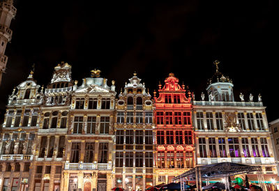 Low angle view of illuminated building at night