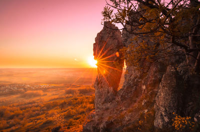 Scenic view of landscape against sky during sunset